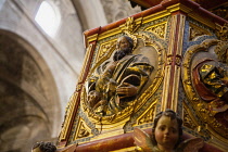Spain, Andalucia, Granada, Carving on the pulpit in the Iglesia del Sagrario.