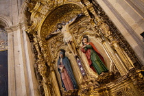 Spain, Andalucia, Granada, Icon of Jesus on the crucifix at Calvary in the Iglesia del Sagrario.