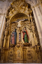 Spain, Andalucia, Granada, Icon of Jesus on the crucifix at Calvary in the Iglesia del Sagrario.