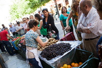 Spain, Andalucia, Granada, Fruit and vegetable stall on Calle San Agustin.