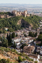 Spain, Andalucia, Granada, The Alhambra and Albayzin district from the viewpoint at Iglesia de San Miguel.