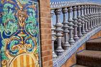 Spain, Andalucia, Seville, Detail of the ceramic balustrade on a bridge over the moat at the Plaza de Espana.