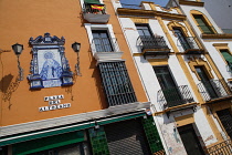 Spain, Andalucia, Seville, Ceramic tile image of the Virgin Mary at Plaza del Altozano in the Triana district.