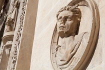 Spain, Andalucia, Seville, Engraving on the facade of the Ayuntamiento Town Hall.