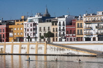 Spain, Andalucia, Seville, Houses of the Triana district on the waterfront of the Rio Guadalquivir.