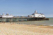 England, East Sussex, Eastbourne, The pier and beach.