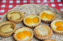 Scotland, Edinburgh, Stockbridge Sunday Market, tarts for sale.