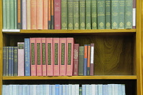 Scotland, Edinburgh, National Library of Scotland, shelves of books.