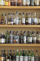 Scotland, Edinburgh, Scotch Whisky Experience, bottles of whisky at the bar.