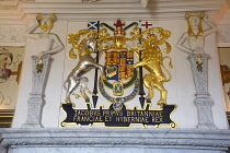 Scotland, Edinburgh, Edinburgh Castle, UK coat of arms above the fireplace in the Royal apartments.