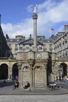 Scotland, Edinburgh, Mercat Cross with City Chambers behind.