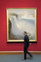Scotland, Edinburgh, National Gallery of Scotland, ' Niagara Falls from the American Side' 1867 by Frederic Edward Church with figure passing.