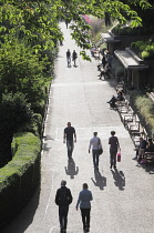Scotland, Edinburgh, Princes Street gardens, West Princes Street gardens with people walking in the sun.