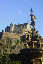 Scotland, Edinburgh, Princes Street gardens, Edinburgh Castle from West Princes Street gardens with the Ross Fountain.