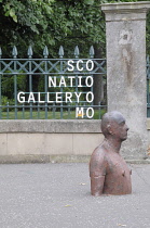 Scotland, Edinburgh, Scottish National Gallery of Modern Art, Modern One, '6 Times' by Anthony Gormley 1 of 6 life size figures along Water of Leith Walkway.