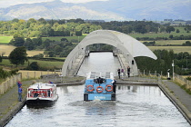 Scotland, Edinburgh, Falkirk Wheel, canal basin with barges.