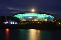 Scotland, Glasgow, The Clyde, The Hydro arena at night.