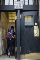 Scotland, Glasgow, Mackintosh Glasgow, Glasgow School of Art 'The Mack', entrance doors (In on the left and Out on the right).