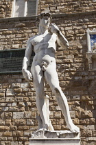 Italy, Tuscany, Florence, Replica of Michelangelo statue of David outside Palazzo Vecchio, Piazza Della Signoria.