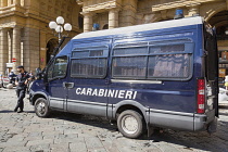 Italy, Tuscany, Florence, Carabinieri military police van and policeman, Piazza Della Repubblica.