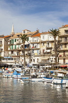 France, Corsica, Calvi, Calvi Harbour and waterfront buildings.