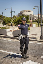 Italy, Sardinia, Olbia, Policewoman.