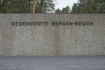 Germany, Lower Saxony, Bergen Belsen, Modern concrete wall denoting the edge of the former concentration camp.