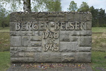 Germany, Lower Saxony, Bergen Belsen, Stone memorial at the edge of the site of the site of the former Concentration and POW camp which was in use from 1940 to 1945 first as a prisoner of war camp hou...