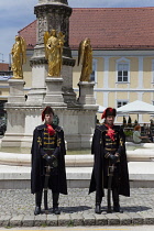 Croatia, Zagreb, Old town, Ceremonial guards and Statue of the Blessed Virgin Mary outside Catholic cathedral.