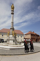 Croatia, Zagreb, Old town, Ceremonial guards and Statue of the Blessed Virgin Mary outside Catholic cathedral.