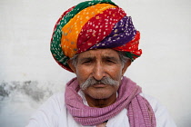 India, Rajasthan, Bikaner, Portrait of a Rajasthani tribal man.