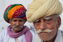 India, Rajasthan, Bikaner, Portrait of two elderly Rajasthani tribal men.