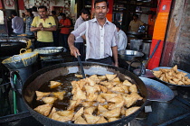 India, Rajasthan, Jodhpur, Frying samosas.