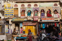 India, Rajasthan, Pushkar, Shop fronts and restaurant signs in Pushkar bazaar.