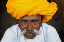 India, Rajasthan, Kekri, Portrait of a Rajasthani tribal man.