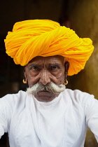 India, Rajasthan, Kekri, Portrait of a Rajasthani tribal man.