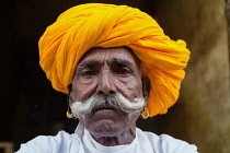 India, Rajasthan, Kekri, Portrait of a Rajasthani tribal man.
