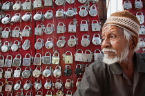 India, Rajasthan, Bundi, Lock vendor in the market at Bundi.