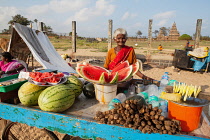 India, Tamil Nadu, Mahabalipuram, Watermelon & pineapple vendor in front of the Shore Temple in Mahabalipuram.