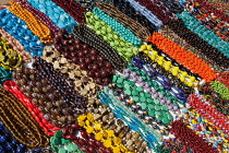 India, Tamil Nadu, Mahabalipuram, Display of beaded necklaces for sale at the entrance to the Shore Temple in Mahabalipuram.
