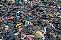 India, Andhra Pradesh, Tirumala, Shoes left by pilgrims outside the entrance to the Sri Venkateswara Swamy Temple at Tirumala.