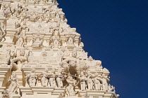 India, Tamil Nadu, Kanniyakumari, Cape Comorin, Detail of the gopuram of a Hindu Temple in Kanniyakumari, Cape Comorin, .