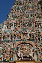 India, Tamil Nadu, Madurai, Detail of the west tower gopuram at the Sri Meenakshi Temple in Madurai.
