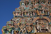 India, Tamil Nadu, Madurai, Detail of the west tower gopuram at the Sri Meenakshi Temple in Madurai.