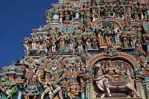 India, Tamil Nadu, Madurai, Detail of the west tower gopuram at the Sri Meenakshi Temple in Madurai.