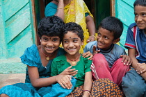 India, Tamil Nadu, Melur, A group of smiling brothers & sisters.