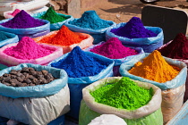 India, Karnataka, Hospet, Display of paint powder in the market at Hospet.