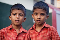 India, Kerala, Ponnani, A pair of twin boys in Ponnani.