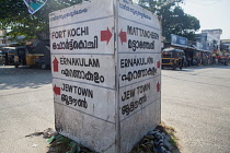 India, Kerala, Road island sign for directions to destinations on Cochin Island.