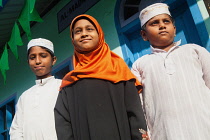 India, Kerala, Alleppey, Portrait of muslim brothers and sister in Alleppey.